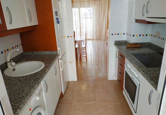 equipped kitchen, washing machine, ceramic hob, beach, new apartments